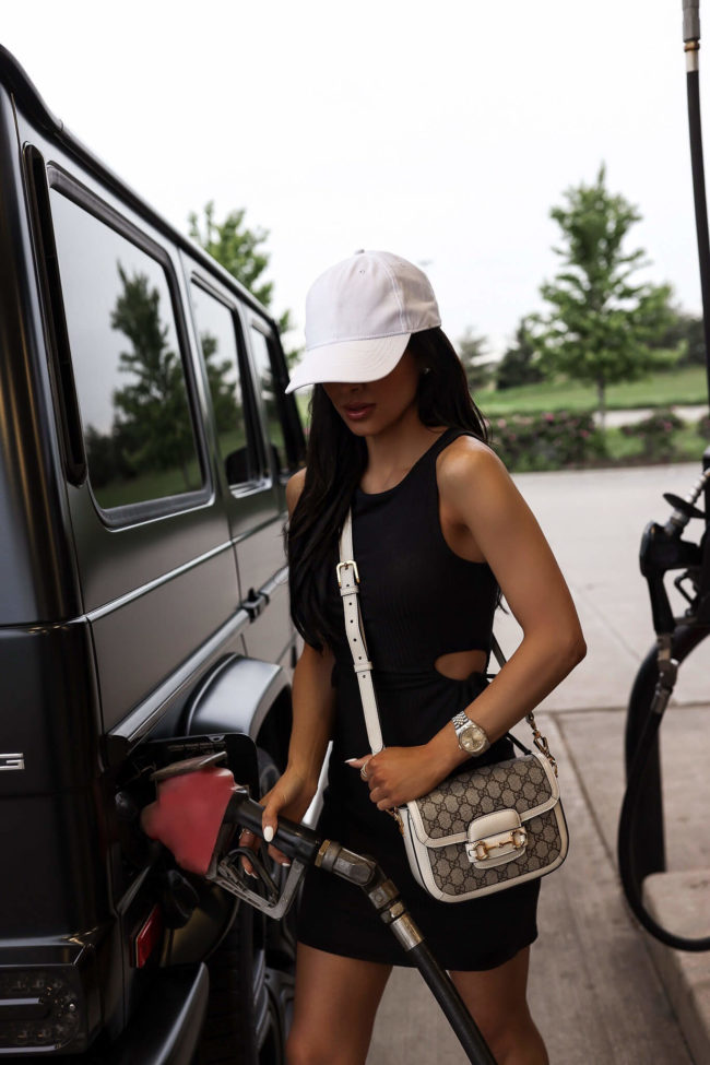 mia mia mine pumping fuel wearing a walmart outfit