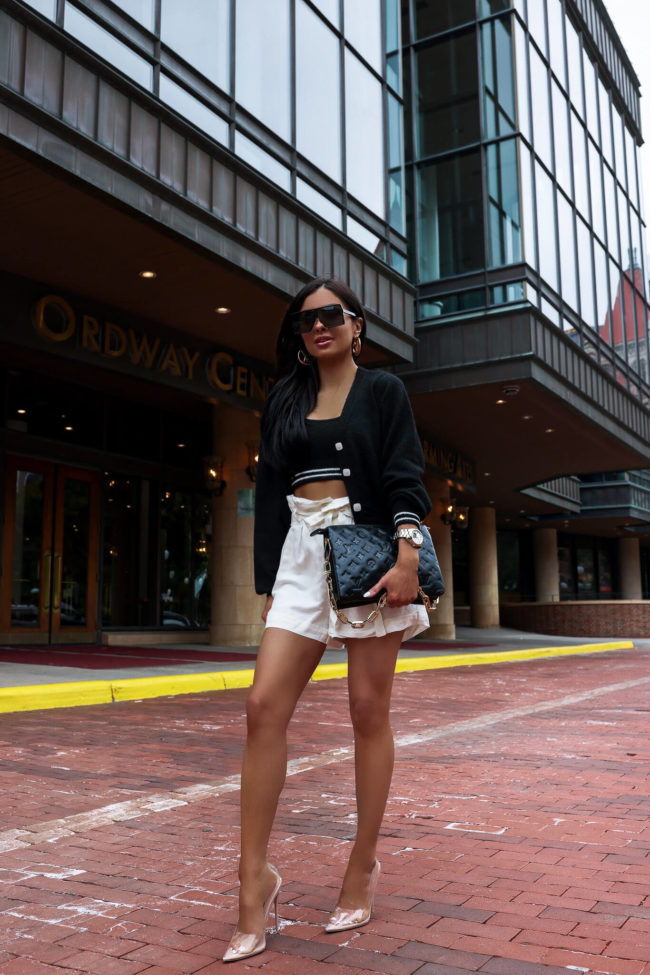 fashion blogger mia mia mine wearing white trouser shorts from nordstrom and clear heels