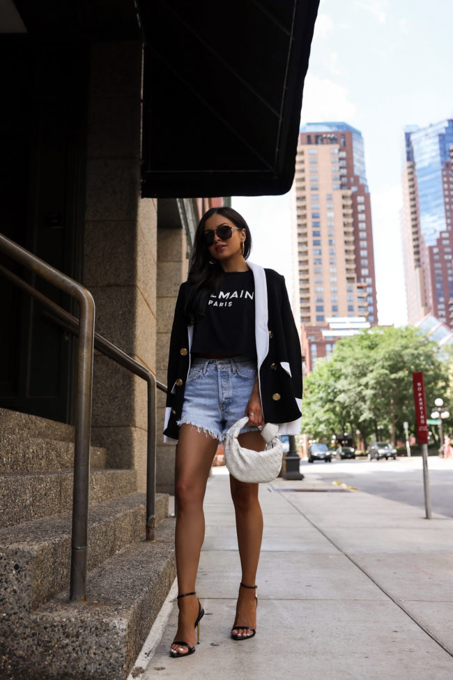 fashion blogger mia mia mine wearing a balmain tee and balmain blazer for summer