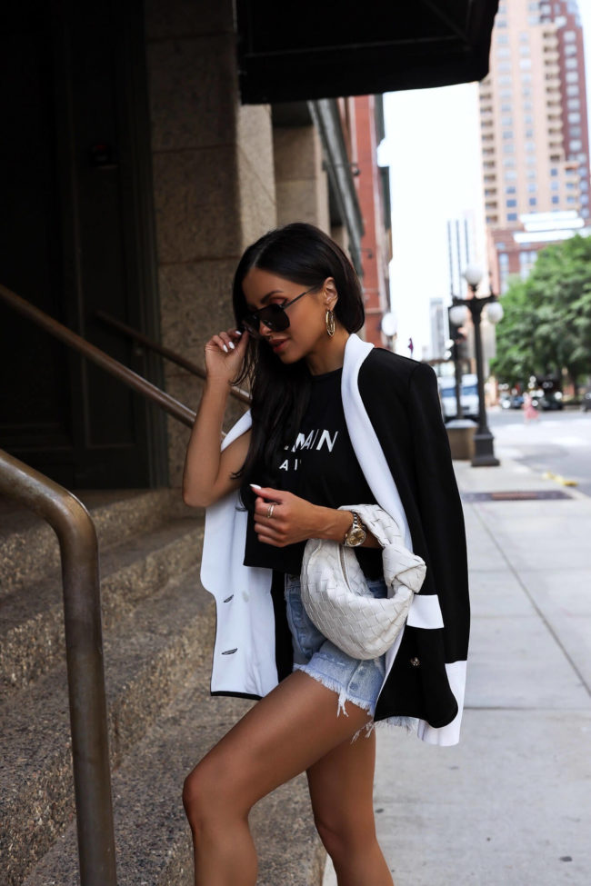 fashion blogger mia mia mine wearing a balmain blazer from mytheresa