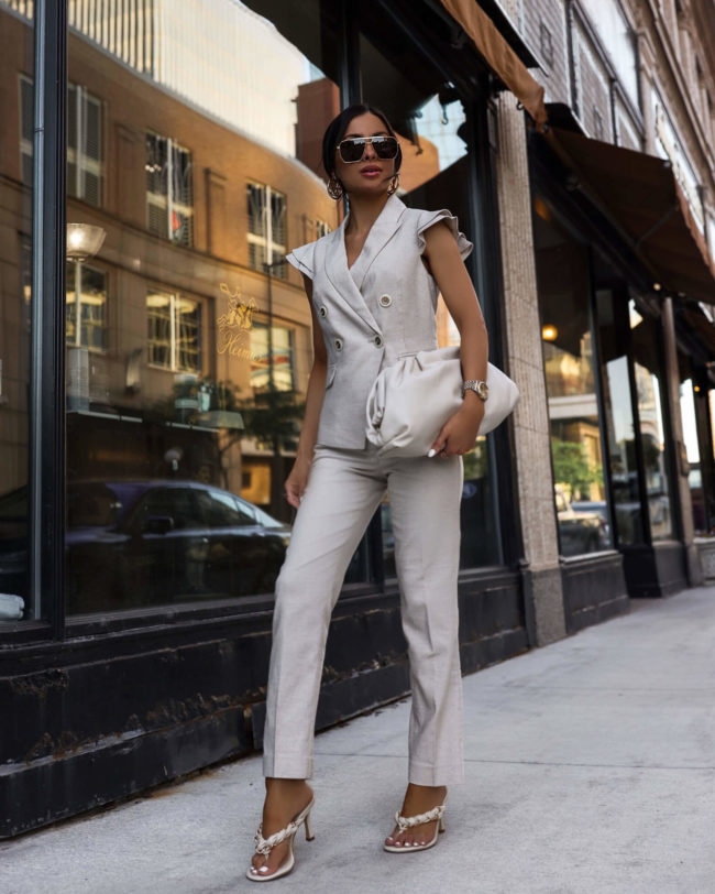 fashion blogger mia mia mine wearing a linen suit from whbm