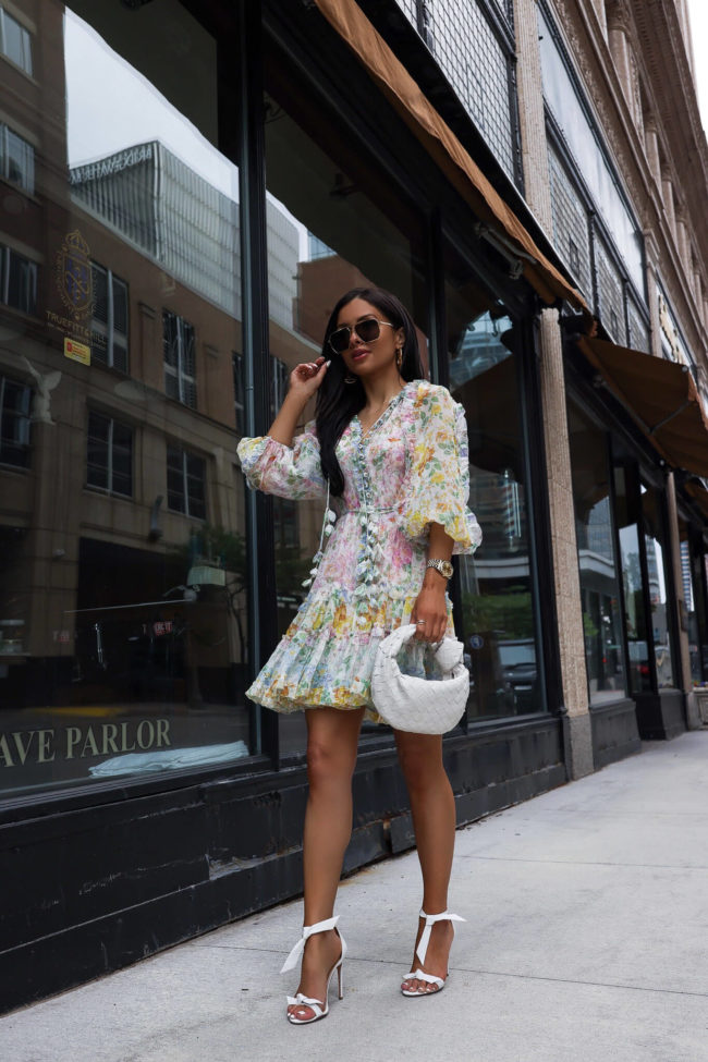 brunette fashion blogger wearing a floral dress by zimmermann