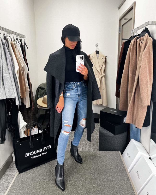 fashion blogger mia mia mine wearing marc fisher black booties from the nsale 2022