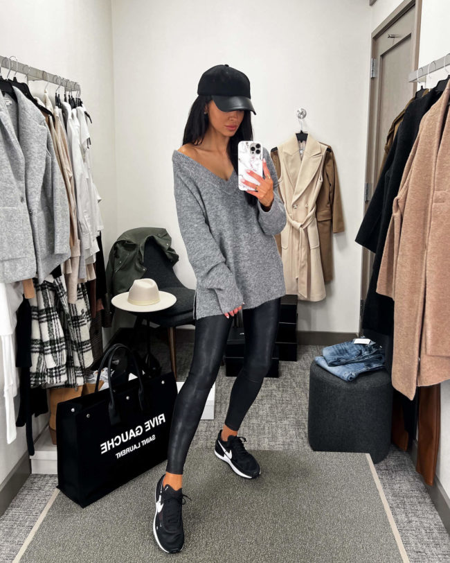 fashion blogger mia mia mine wearing a gray sweater by vince from the nsale 2022