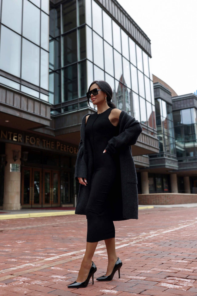 fashion blogger mia mia mine wearing a naked wardrobe body con black dress from the nsale 2022