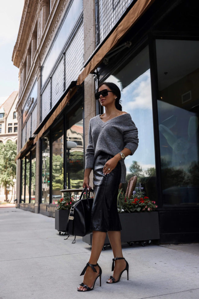 fashion blogger mia mia mine wearing a faux leather croc skirt from the nsale 2022