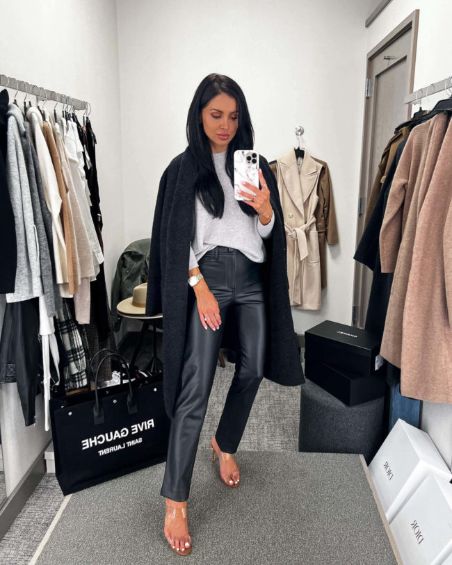 fashion blogger mia mia mine wearing faux leather pants from the nsale 2022