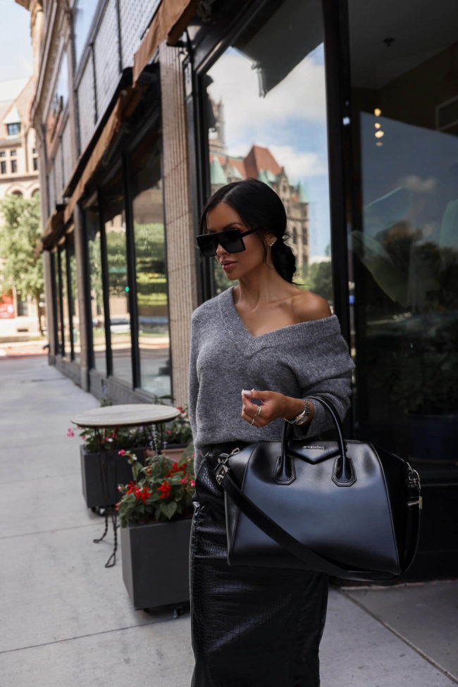 fashion blogger mia mia mine wearing a gray cashmere sweater from the nordstrom anniversary sale 2022