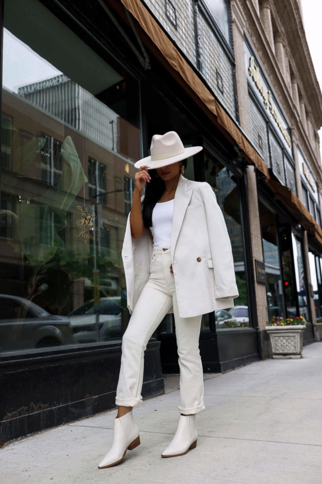 fashion blogger mia mia mine wearing white marc fisher booties from the nordstrom anniversary sale 2022