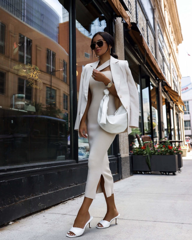 fashion blogger mia mia mine wearing a white summer outfit from express