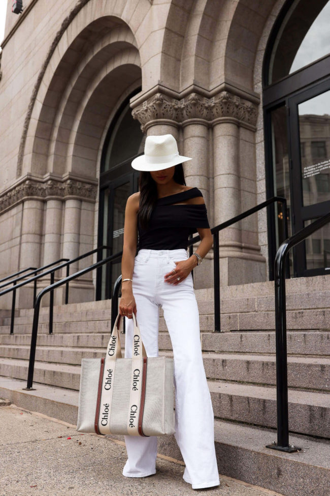 fashion blogger mia mia mine wearing white good american denim from saks