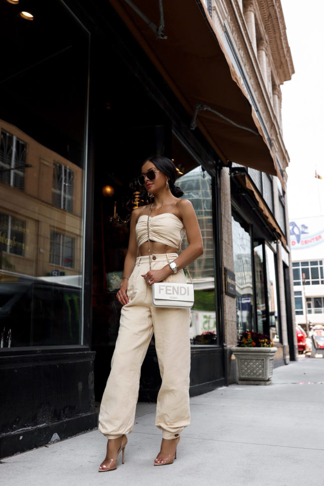 fashion blogger wearing an ivory matching set from revolve