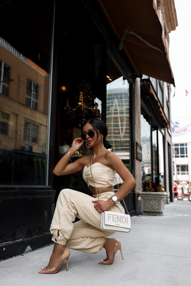 fashion blogger mia mia mine wearing an ivory set from revolve