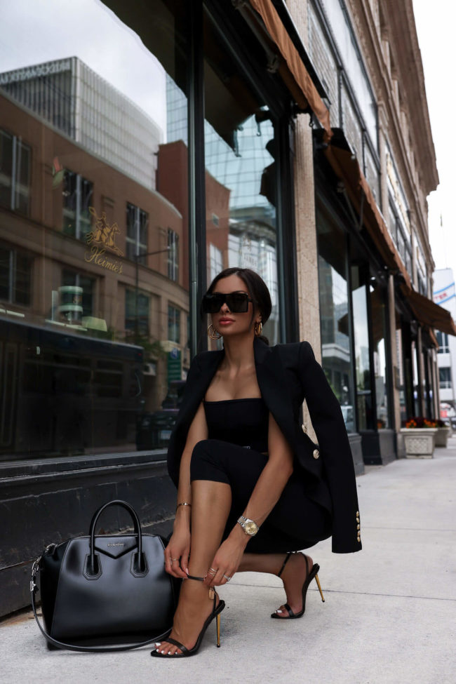 fashion blogger mia mia mine wearing a tom ford bralette and leggings from ssense