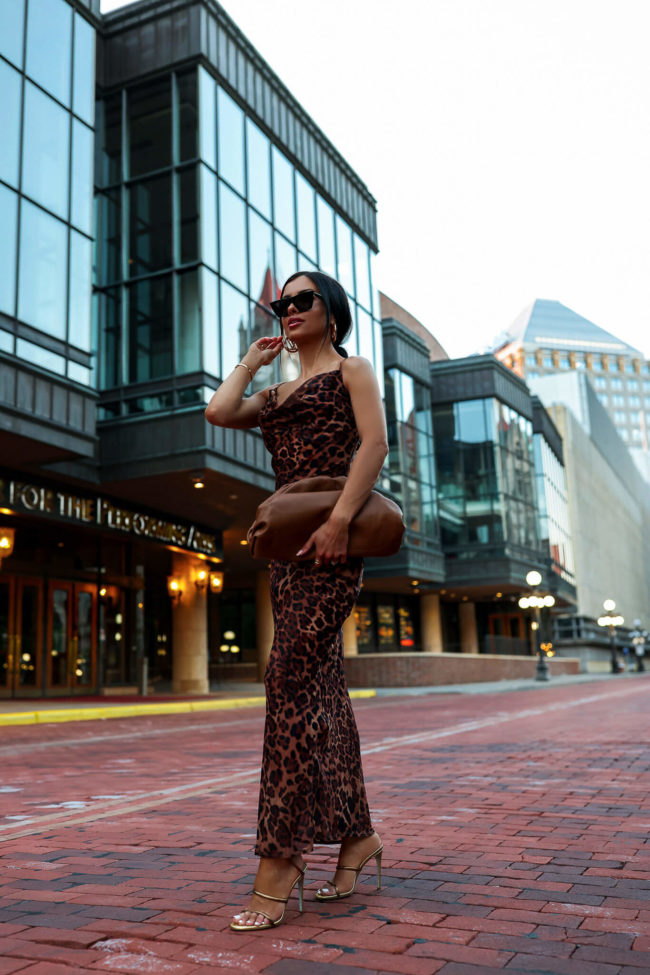 fashion blogger wearing a leopard slip dress from revolve