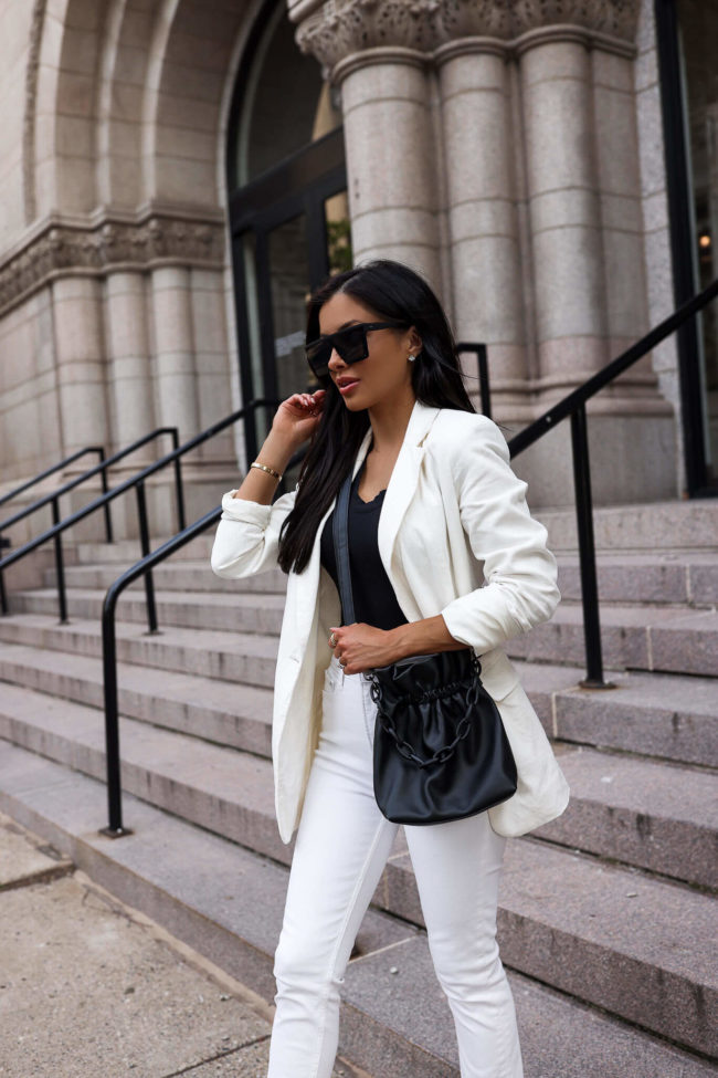 fashion blogger mia mia mine wearing a white blazer by free assembly from walmart