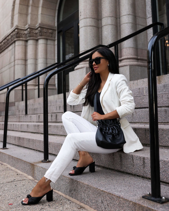 fashion blogger mia mia mine wearing a white summer outfit from walmart