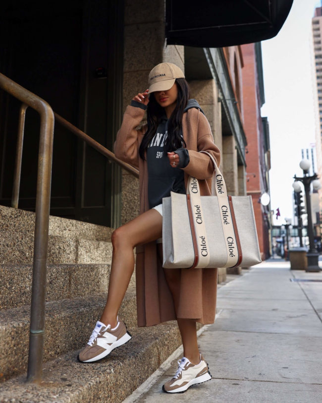 fashion blogger wearing a mango coatigan and new balance 327 sneakers