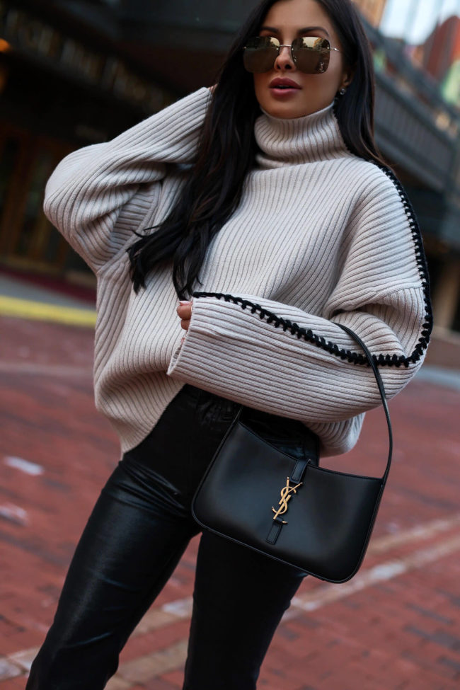 fashion blogger mia mia mine wearing a saint laurent le 5 a 7 bag