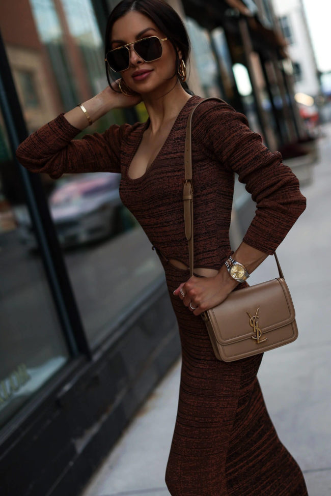 Fashion blogger mia mia mine wearing a knit dress from saks