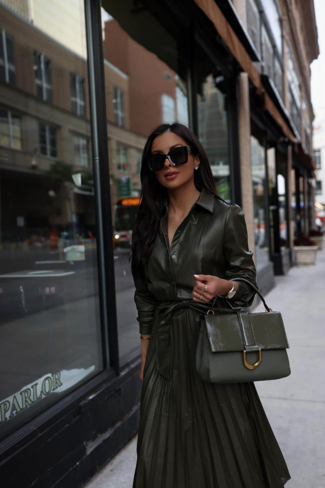 fashion blogger mia mia mine wearing a green dress from walmart