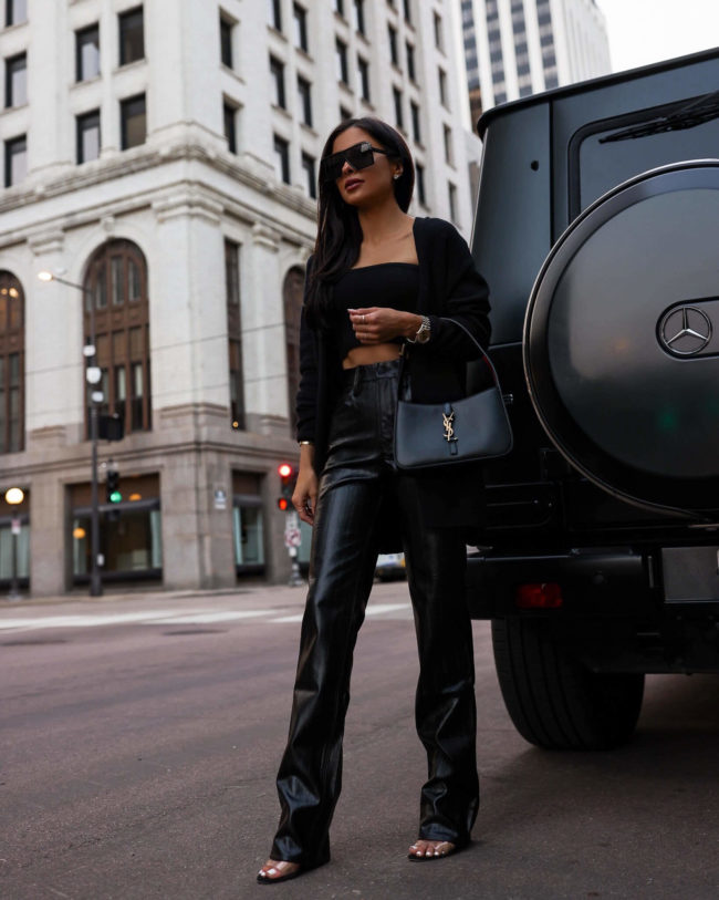mia mia mine wearing an all black date night look for fall