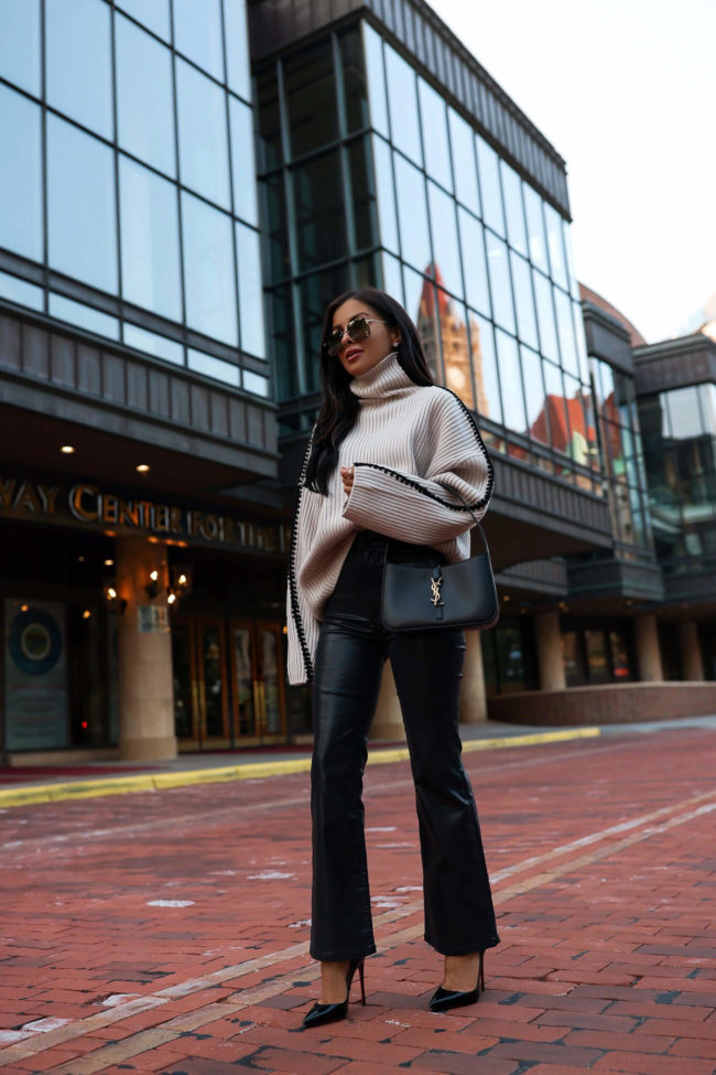fashion blogger wearing a rag & bone sweater and coated denim from neiman marcus