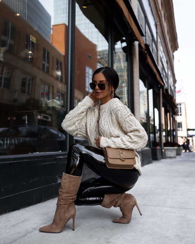 fashion blogger wearing tan suede slouchy boots for fall 2022