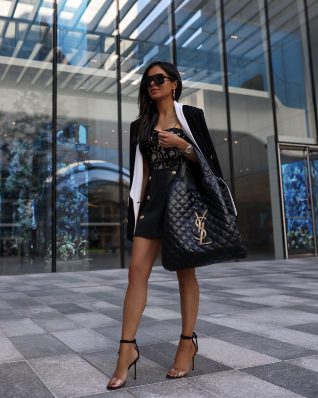 mia mia mine wearing a saint laurent quilted tote