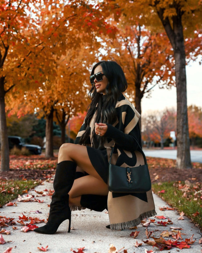 fashion blogger mia mia mine wearing schutz suede boots and a burberry scarf from saks