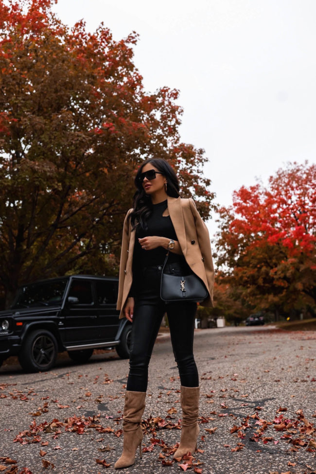 fashion blogger wearing marc fisher slouchy suede boots
