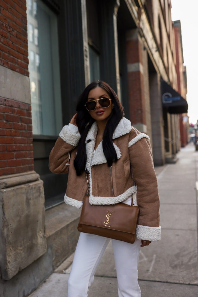 brunette fashion blogger wearing a fall outfit from abercrombie