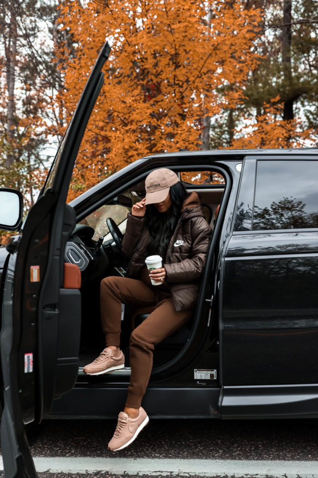 mia mia mine wearing a brown nike fall outfit