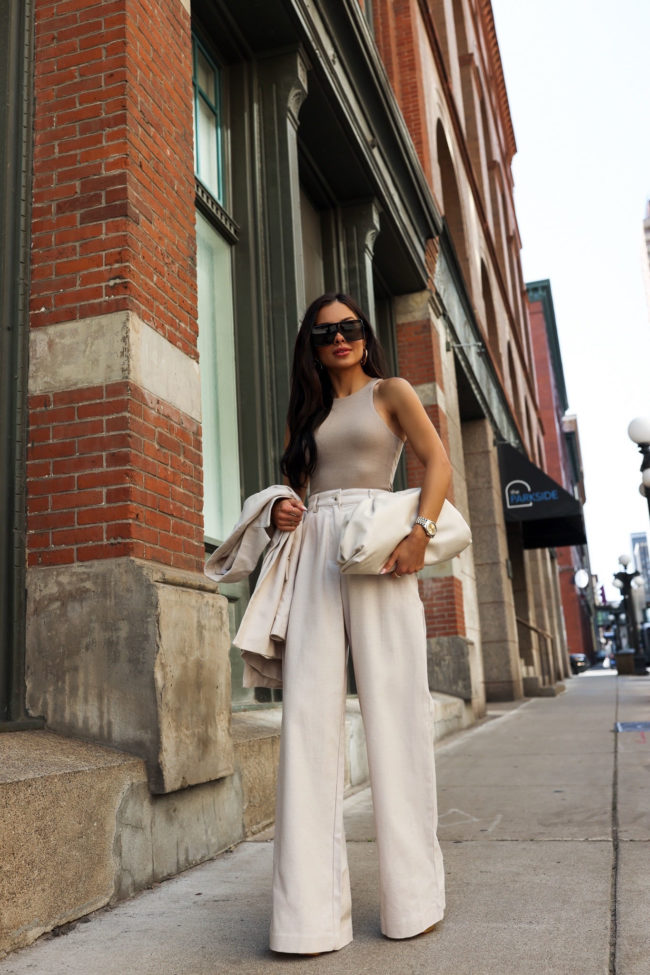 fashion blogger wearing a tan suit from revolve