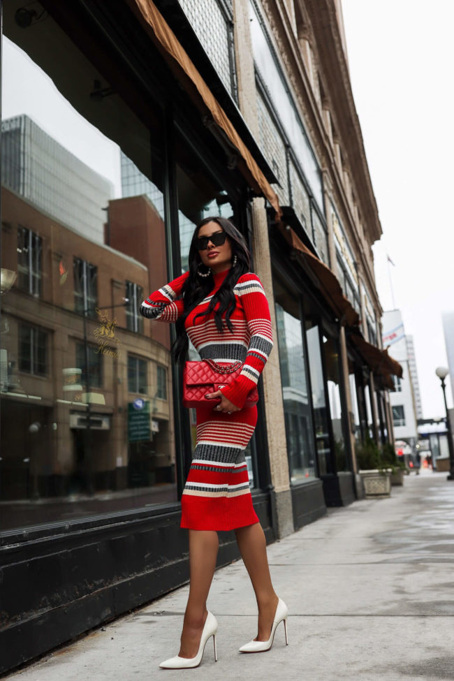 fashion blogger mia mia mine wearing a holiday striped dress from walmart
