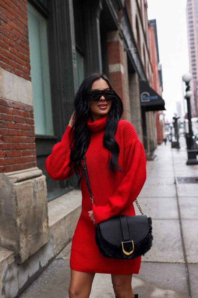 fashion blogger mia mia mine wearing an affordable sweater dress from walmart