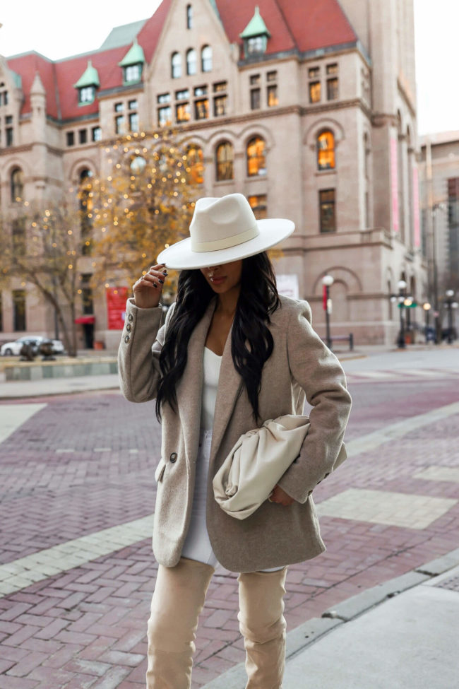 fashion blogger mia mia mine wearing a tan blazer by free people from nordstrom
