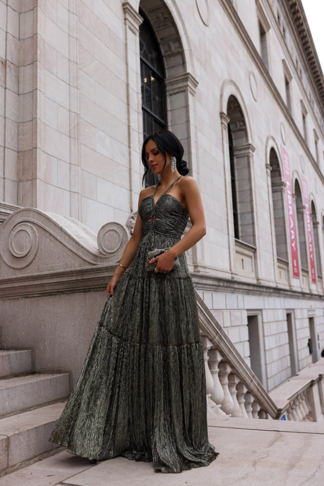 fashion blogger mia mia mine wearing a sparkly holiday dress from saks