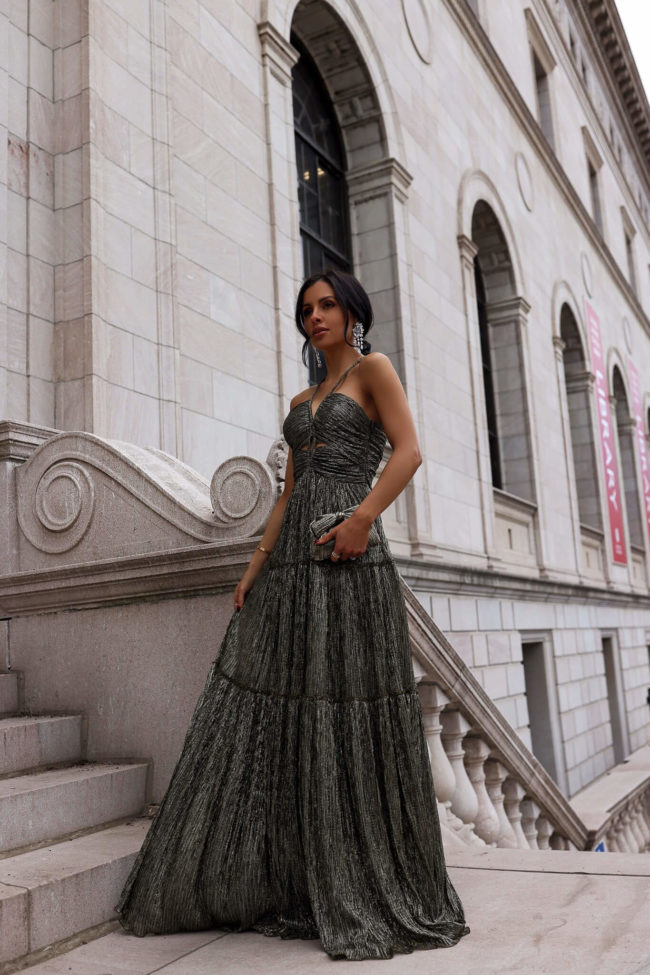 fashion blogger mia mia mine wearing an evening dress from saks