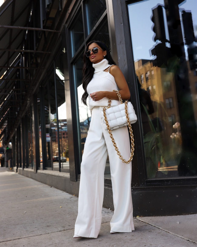 fashion blogger wearing a white outfit for fall