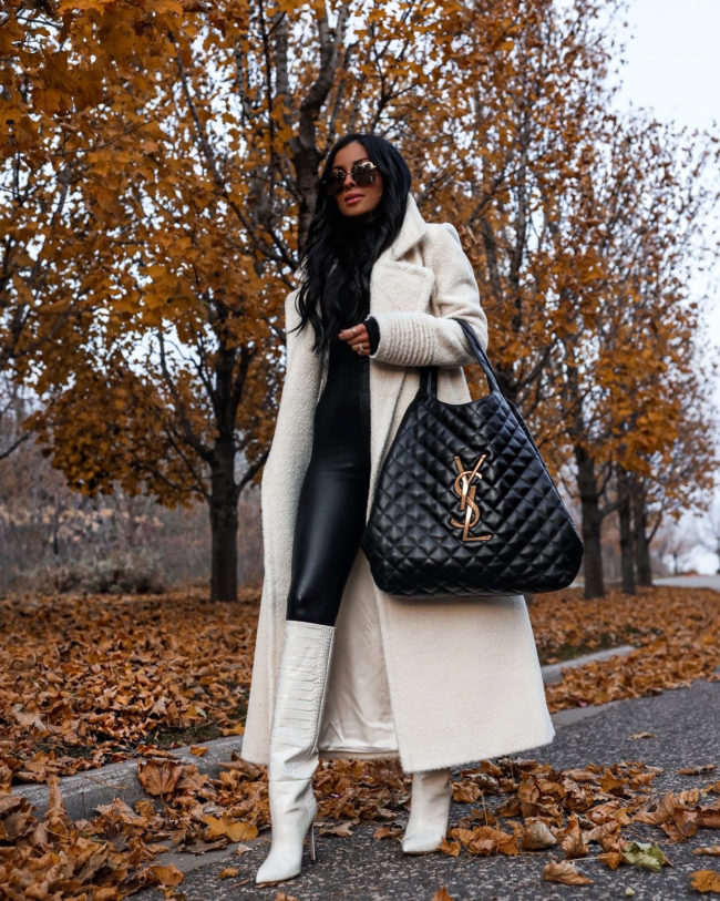 mia mia mine wearing a white shearling coat for winter