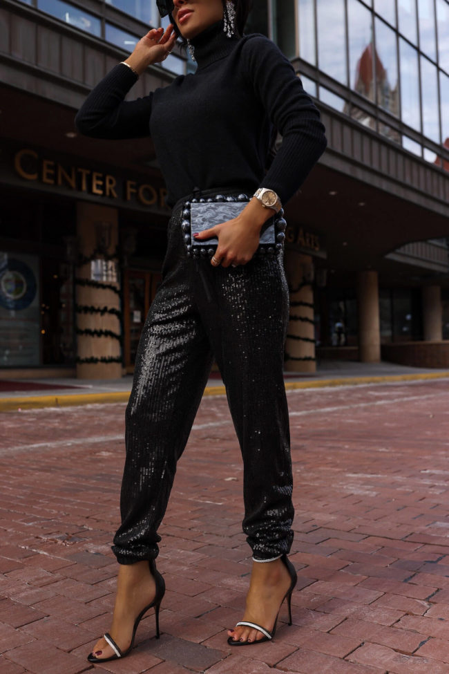 fashion blogger mia mia mine wearing sequin jogger pants for new year's eve