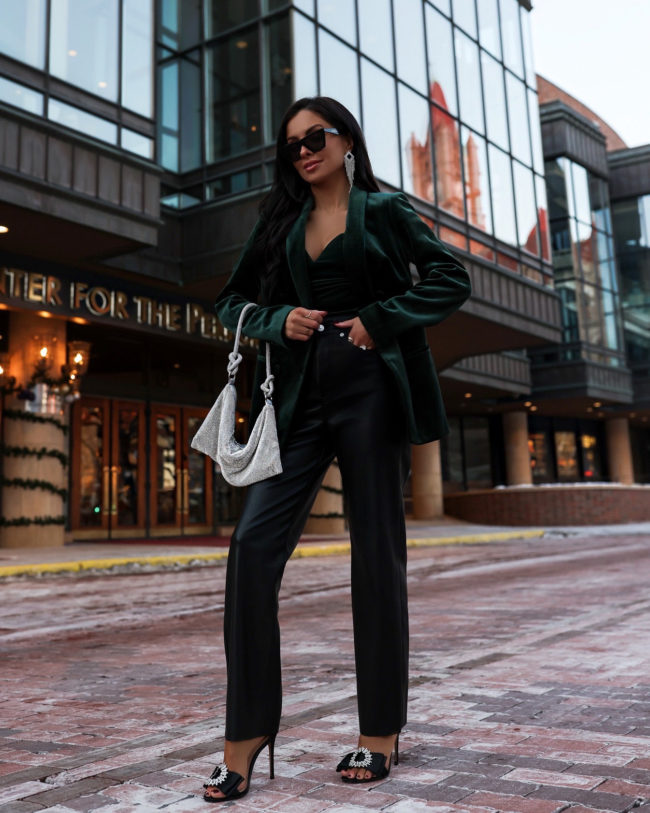 fashion blogger wearing a shimmer handbag for the holidays
