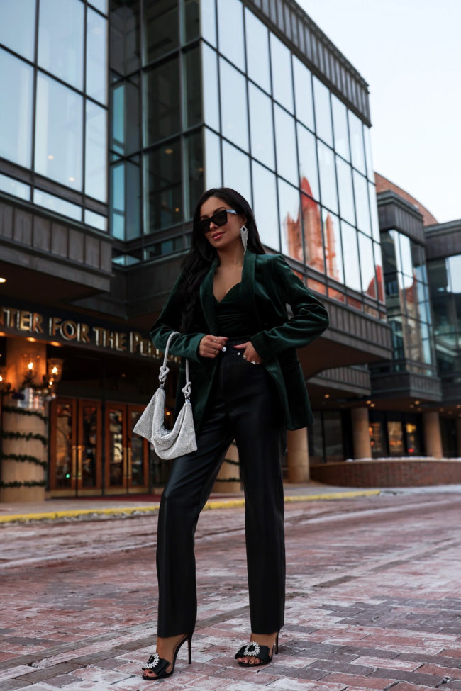 fashion blogger mia mia mine wearing a holiday party outfit from express