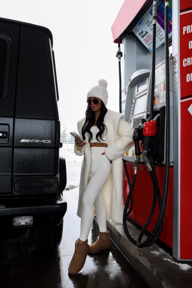 fashion blogger mia mia mine pumping gas with walmart plus fuel savings