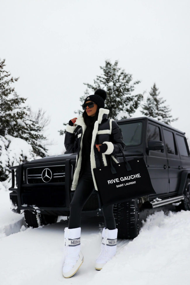 fashion blogger mia mia mine wearing black commando leggings in the snow