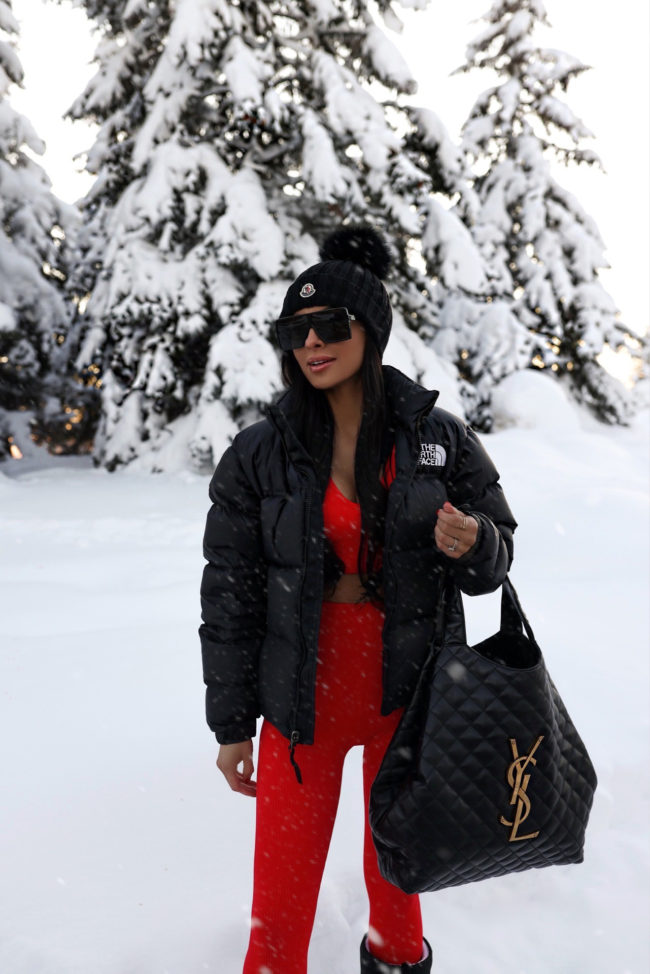 fashion blogger wearing a north face puffer jacket