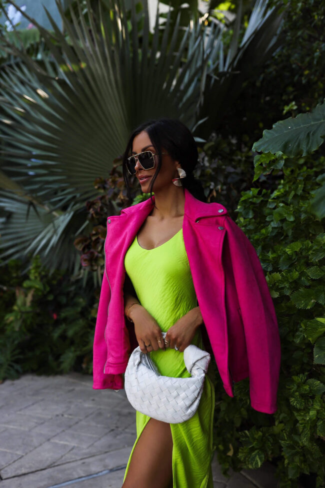 fashion blogger mia mia mine wearing a bright pink moto jacket from walmart's scoop line