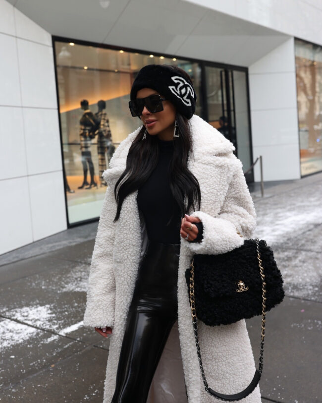 fashion blogger mia mia mine wearing a chanel hat for winter
