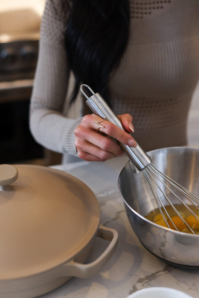 woman whisking eggs